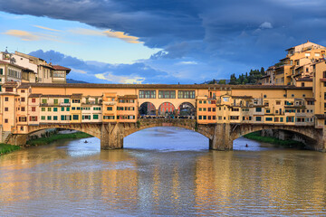 Fototapeta na wymiar View of the Arno river in Florence, Italy: in the background Ponte Vecchio.