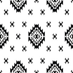 Aztec and Navajo seamless repeat pattern. Figure tribal embroidery. Ethnic geometric abstract backdrop. Black and white. Design for fabric, textile, ornament, clothing, background, wrapping, batik.