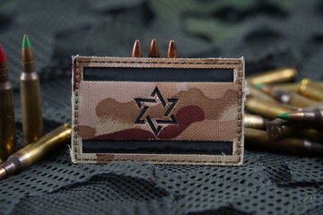 Israel Flag Tactical  on patch with weapon ammunition.  bullets ammunition. IDF military.