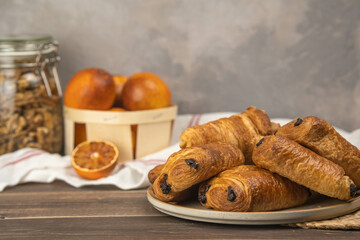 Chocolate croissants on plate. pain au chocolat