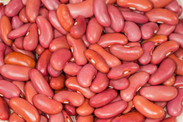 Heap of raw red kidney beans, top view close-up