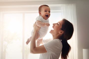 Joyful Moments  Laughing Mother Lifting Her Newborn in Air with Panorama and Copy Space