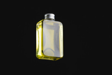 Beauty product perfume bottle with copy space on black background