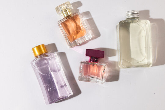 Beauty product perfume bottles with copy space on white background
