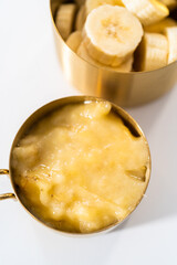 Mashed and sliced bananas