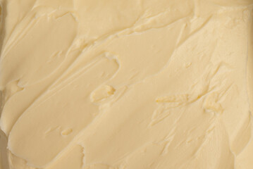 Texture of tasty homemade butter as background, top view