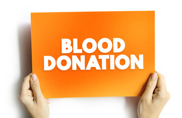 Blood Donation is a voluntary procedure that can help save lives, text concept on card for presentations and reports