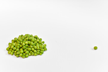 fresh green peas on a white background