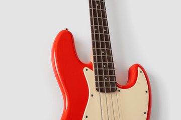 Fototapeta premium Red bass guitar on white background