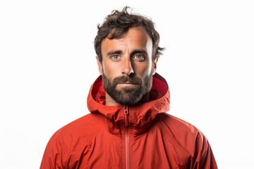 Obraz premium Portrait of a content man in his 30s wearing a functional windbreaker against a white background. AI Generation