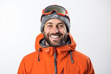 Fototapeta premium Portrait of a happy man in his 30s dressed in a warm ski hat against a white background. AI Generation