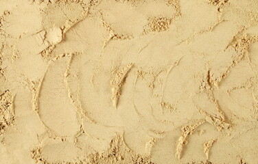 Ginger powder background and texture, top view
