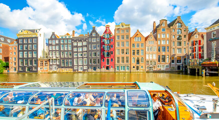 Panoramic view of Amsterdam city, colorful dancing houses over Damrak canal - obrazy, fototapety, plakaty