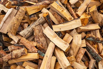Stack of firewoods, logs abstract background