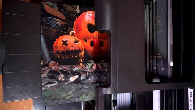 printing color photos halloween october holiday orange pumpkin and candles on an inkjet printer