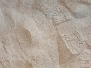Image of sand with shoe marks