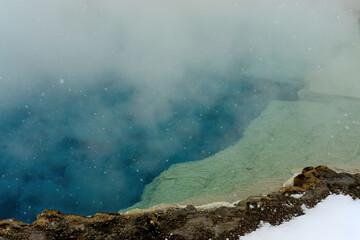 Winter Snowing Geothermal Pool Yellowstone