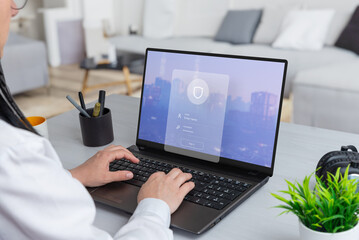 Woman working on a laptop, featuring a security login form hovering above. Merge productivity with...