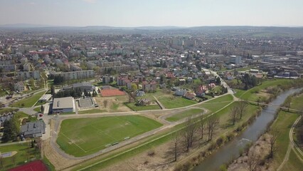 Fototapeta na wymiar Jaslo, Poland - 9 9 2018: Photograph of the old part of a small town from a bird's flight. Aerial photography by drone or quadrocopter. Advertise tourist places in Europe. Planning a 