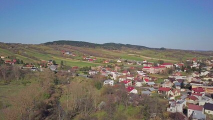 Fototapeta na wymiar Kolaczyce, Poland - 9 9 2018: Photograph of the old part of a small town from a bird's flight. Aerial photography by drone or quadrocopter. Advertise tourist places in Europe. Planning a 