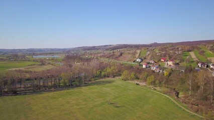 Fototapeta na wymiar Kolaczyce, Poland - 9 9 2018: Photograph of the old part of a small town from a bird's flight. Aerial photography by drone or quadrocopter. Advertise tourist places in Europe. Planning a 