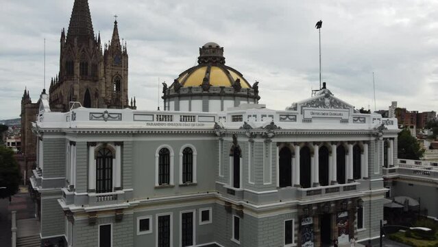 buildings with art nouveau style and in the background the expiatory of the city of Guadalajara
