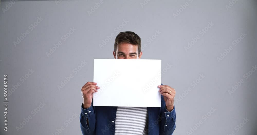 Wall mural Face, man and poster sign for advertising, marketing and commercial promotion, announcement and information. Portrait, paper banner and person on mockup space presentation flyer on a grey background