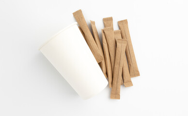 paper sugar sticks isolated on white background