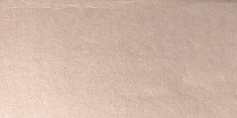 Brown paper texture with grain detail on it surface.