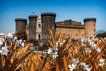 the Castle of Naples, also called Maschio Angioino or Castel Nuovo, stands in the city center, a...