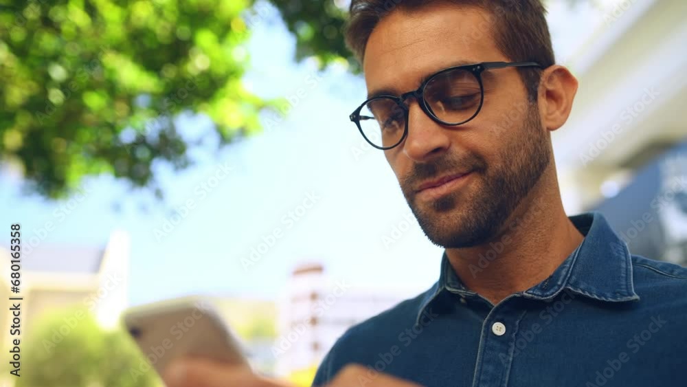 Aufkleber Man, happy and phone outdoor with typing for directions, text message or networking in nature and smile. Person, smartphone and texting, mobile chat or communication with cellular, internet and web
