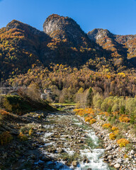 Fototapeta na wymiar Beautiful landscape during fall season, in Valsesia (Sesia Valley). Province of Vercelli, Piedmont, Italy.