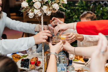 a man with a glass of wine at a festive banquet