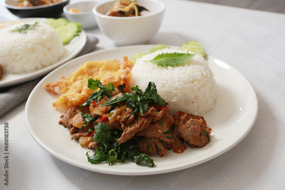 Wall mural stir fried beef with tree basil leave. /thai food