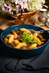 Beef stew in gravy.