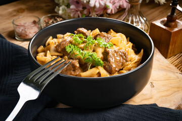 Tagliatelle mosse with beef sauce.