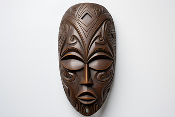 Dark Brown Wooden Mask in Traditional Carving Against a White Background