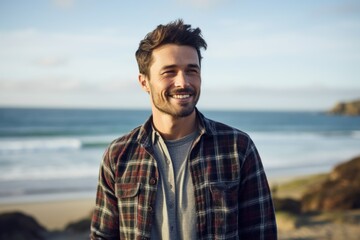 Portrait of a blissful man in his 20s dressed in a relaxed flannel shirt against a serene seaside background. AI Generation