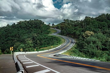Sky winding road over top of mountains with green jungle in Nan, Road no.3, Thailand