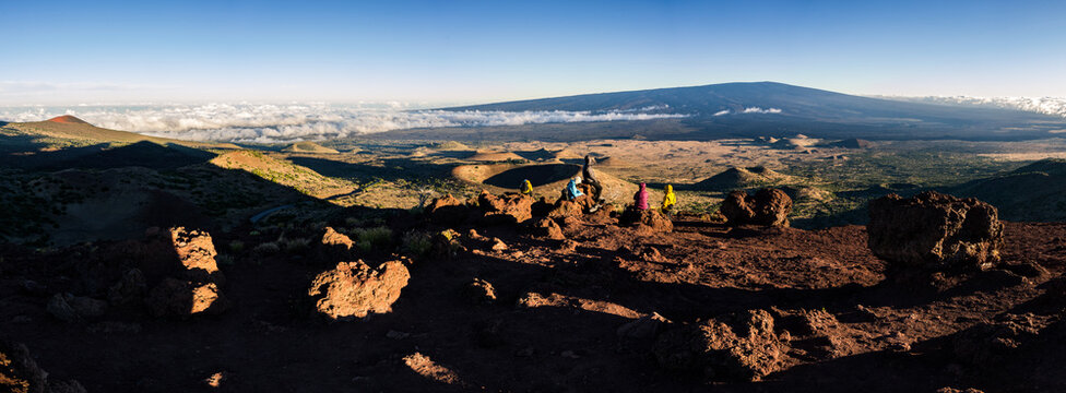 Hawaii volcano sunset panoramic view with dramatic clouds over the Mauna Kea