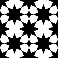 Seamless geometric ornament based on traditional islamic art. White figures on black background. Great design for fabric,textile,cover,wrapping paper,background.