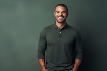 Fototapeta premium Portrait of a blissful man in his 30s donning a classy polo shirt against a minimalist or empty room background. AI Generation