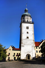 Fototapeta na wymiar Nikolai Church Tower, a Romanesque fortified church from the 13th century in Altenburg, Thuringia, Germany
