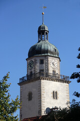 Fototapeta na wymiar Nikolai Church Tower, a Romanesque fortified church from the 13th century in Altenburg, Thuringia, Germany