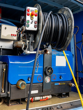 Sewer cleaning equipment service vehicle. Equipment for hydraulic flushing of urban sewerage. control panel, hoses, pumps, pressure gauges
