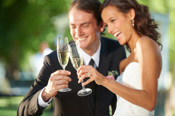 Outdoor, champagne and bride with groom, hug and support with relationship, romance and celebration. Romantic, outside or man with woman, marriage or happiness with love, cheers or wedding with smile