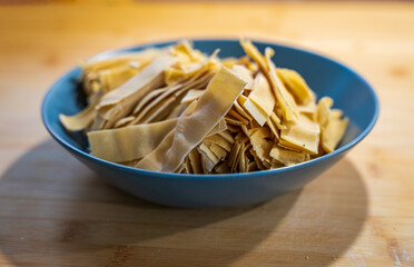 Self made lasagne noodles in private kitchen in close up view