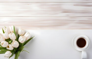 white wooden office table, coffee cup and flowers for freelancing business card decor