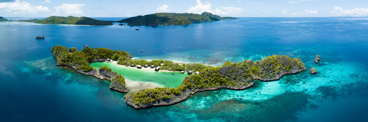 Idyllic Rufas Island, near Penemu in Raja Ampat, is surrounded by healthy corals and open ocean....