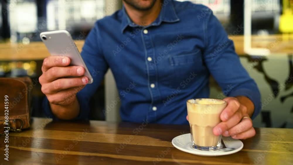 Poster hands, phone and coffee with a person in cafe closeup at table for social media or communication. mo